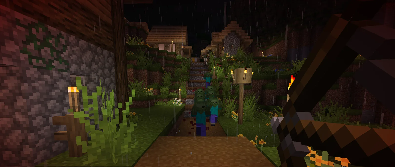 Zombies climbing a village path at night